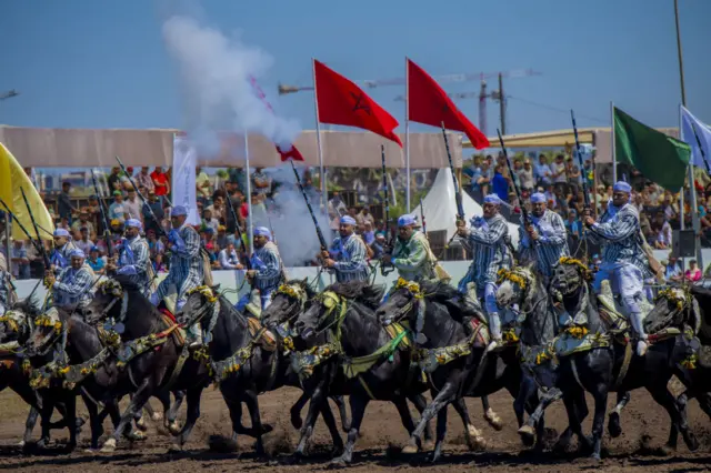 Horse riders perform during the historic equestrian performance called Tbourida in Bouznika, Morocco - 10 May 2023