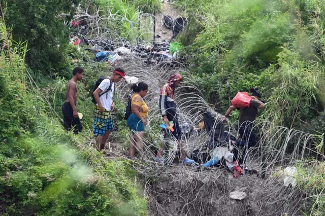 Migrant people try to get to the US through the Rio Grande as seen from Matamoros, state of Tamaulipas, Mexico