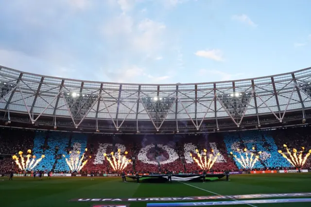 West Ham fans unveil a tifo before the game.