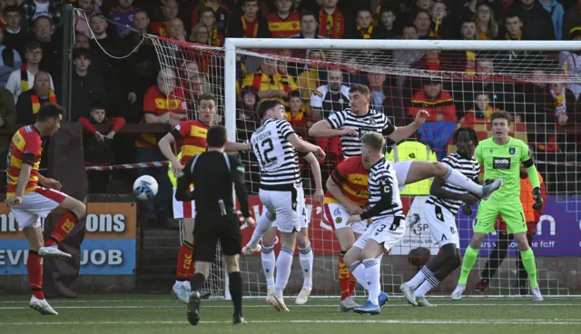 Brian Graham volleys Thistle in front