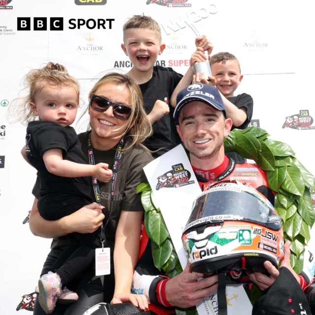 Glenn Irwin celebrates after todays opening Superbike race. with wife Laura and kids, Freddie, Carter & Gia