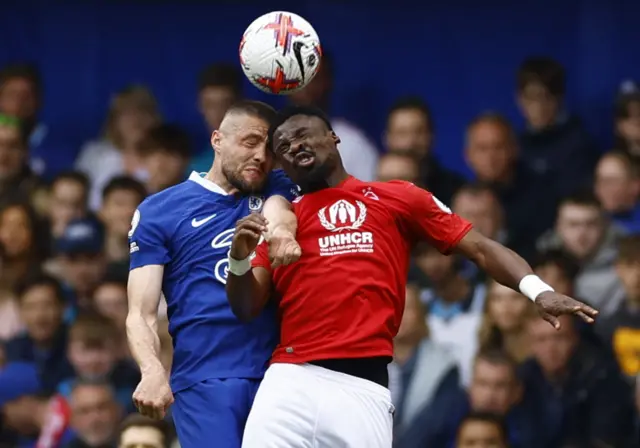 Nottingham Forest's Serge Aurier in action with Chelsea's Mateo Kovacic