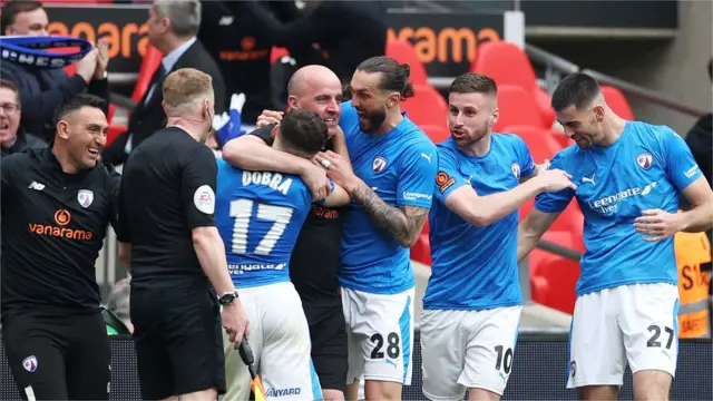 Chesterfield celebrate Armando Dobra's equaliser in extra time against Notts County