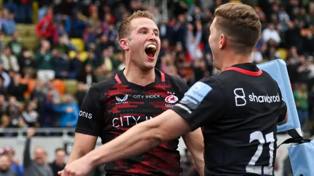 Saracens celebrate reaching the Premiership final