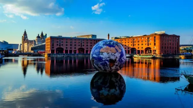 Luke Jerram's Earth is floating in the Albert Dock in Liverpool