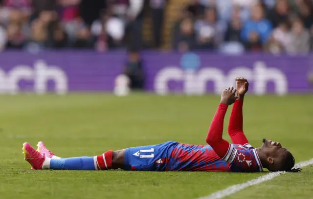 Crystal Palace's Wilfried Zaha struggles with a hamstring injury