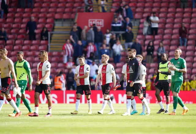 Southampton players applaud the fans for their support.