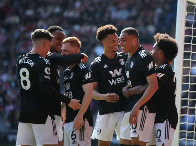 Vinicius celebrates scoring the opener at St Mary's.