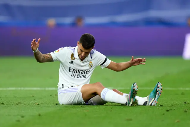 Dani Ceballos hits the ground in frustration.