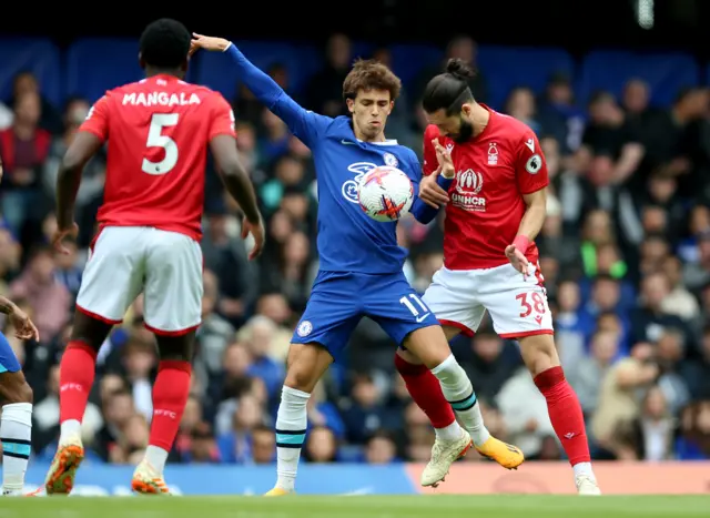 Chelsea's Joao Felix and Nottingham Forest's Augusto Felipe battle for the ball