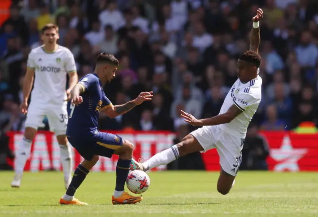 Firpo lunges in high on Guimaraes.