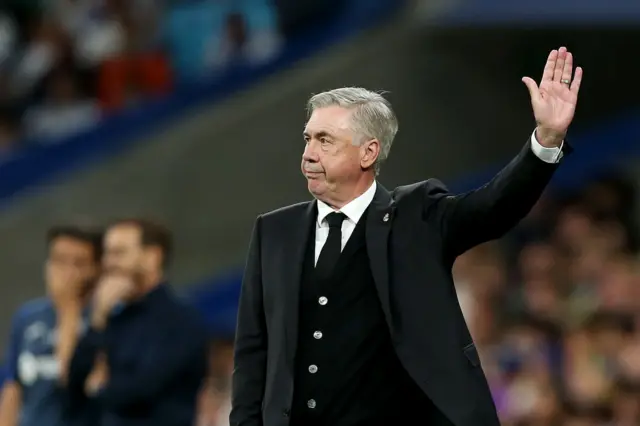 Ancelotti waves irritably at a decision.