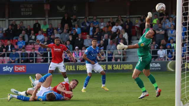 Matt Smith gives Salford the lead against Stockport