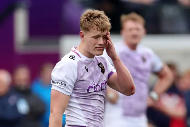 Northampton's Fin Smith looks dejected