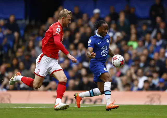 Chelsea's Raheem Sterling in action with Nottingham Forest's Joe Worrall