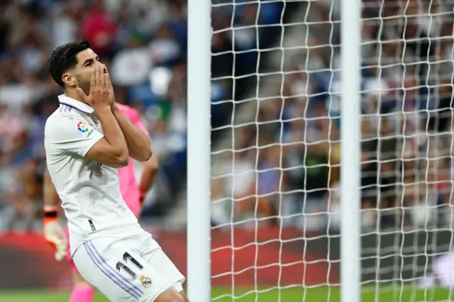 Marca Asensio stands in disbelief that he missed the target.