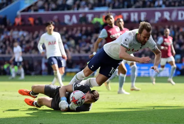 Aston Villa's Emiliano Martinez fouls Tottenham Hotspur's Harry Kane to concede a penalty