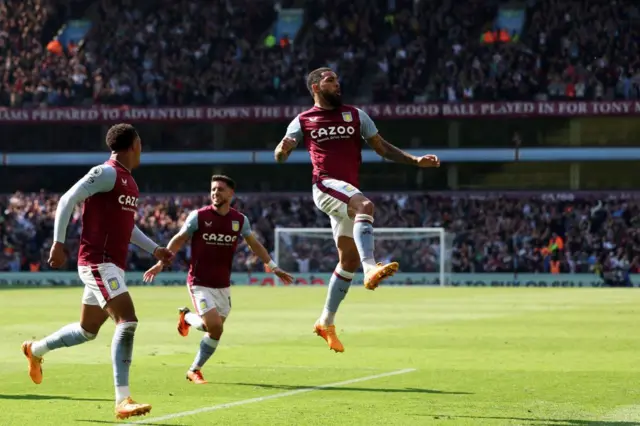 Douglas Luiz celebrates scoring his team's second goal against Tottenham