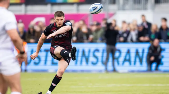 Owen Farrell kicks a penalty for Saracens