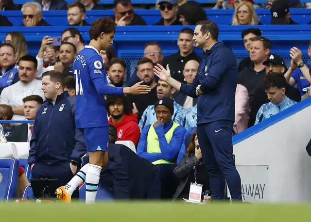 Chelsea's Joao Felix shakes hands with manager Frank Lampard after being substituted off