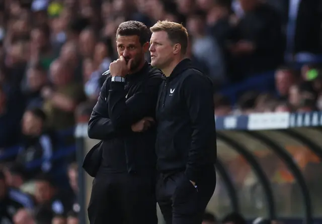 Eddie Howe speaks to his assistant Jason Tindall.