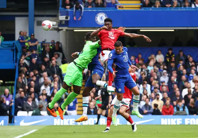 Taiwo Awoniyi of Nottingham Forest scores against Chelsea