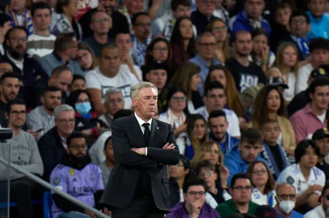 Carlo Ancelotti looks on unimpressed.