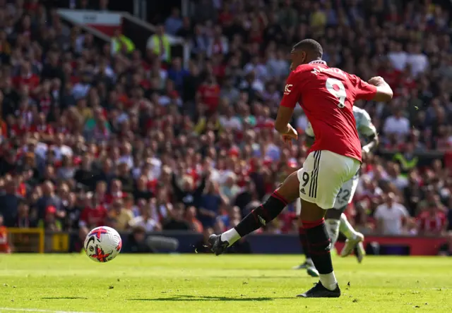 Martial strokes home the opener for Man Utd.