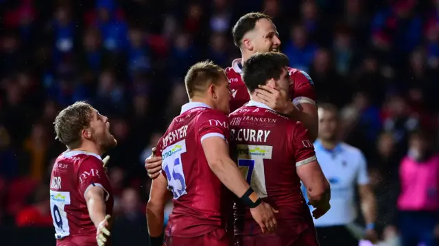 Sale Sharks players celebrate a try