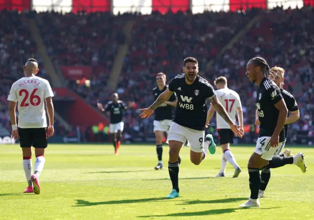 Mitrovic celebrates scoring on his return to action.