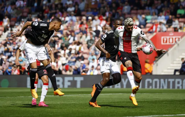 Lyanco blocks an attempted shot from Vinicius.