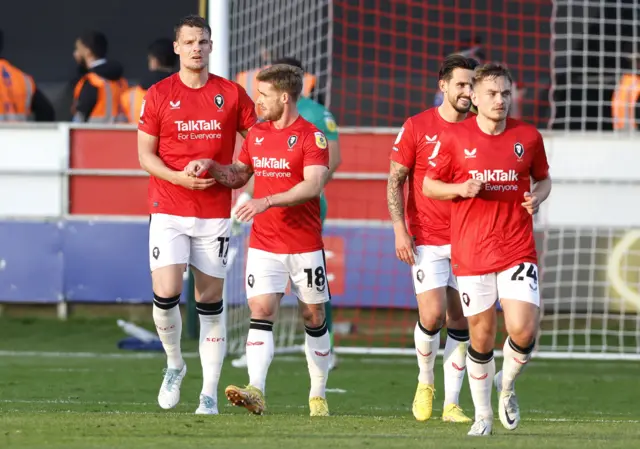 Salford celebrate Matt Smith's opening goal