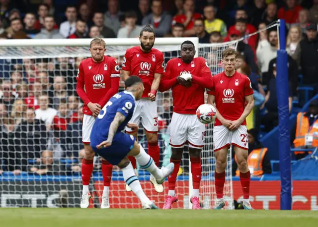 Nottingham Forest's Joe Worrall, Felipe, Moussa Niakhate and Ryan Yates attempt to block a free kick taken by Chelsea's Enzo Fernandez