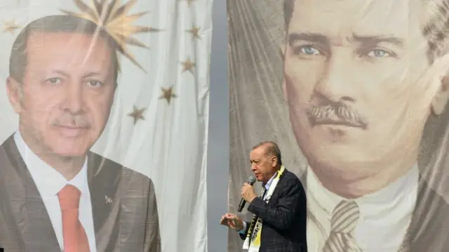 Turkish President Tayyip Erdogan addresses his supporter