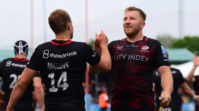 Max Malins and Jackson Wray congratulate each other as Saracens beat Northampton