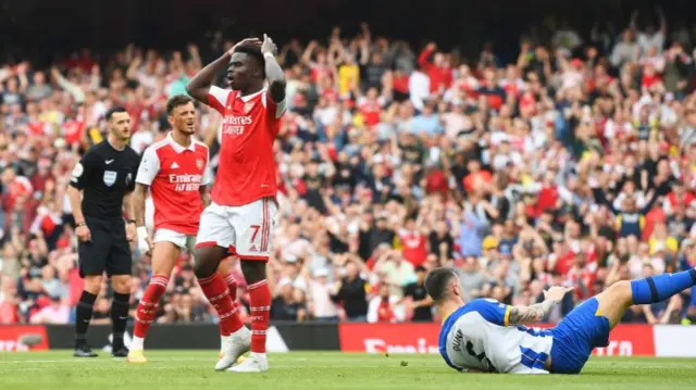 Arsenal's Bukayo Saka looking disappointed after going close to scoring aganst Brighton