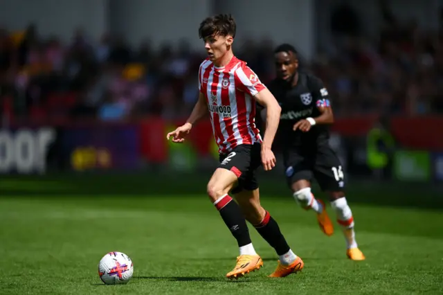 Aaron Hickey with the ball for Brentford