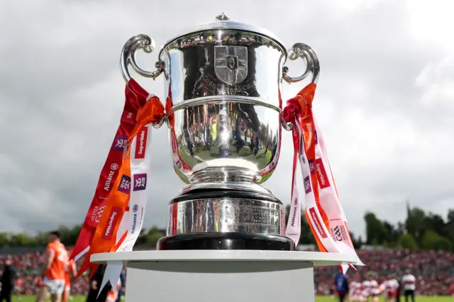 A view of the trophy on display before the game