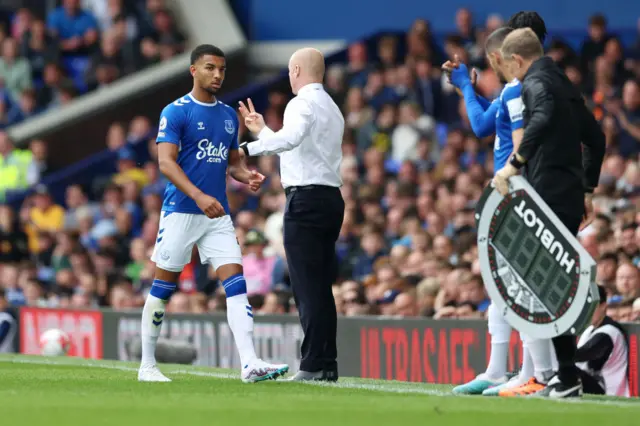 Mason Holgate of Everton is substituted against Manchester City