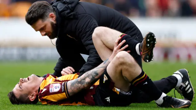 Jamie Walker receives treatment