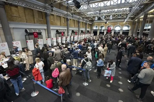 Turkish voters inside in the polling station in London