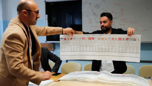 Officials count votes on the day of the presidential and parliamentary elections in Istanbul, Turkey, on 14 May 2023