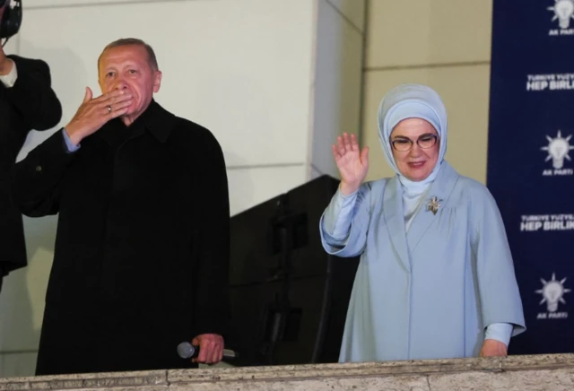 Recep Tayyip Erdogan and his wife Emine Erdogan on the balcony of AKP headquarters in Ankara