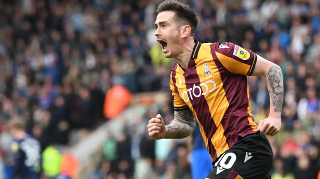 Jamie Walker celebrates his goal for Bradford