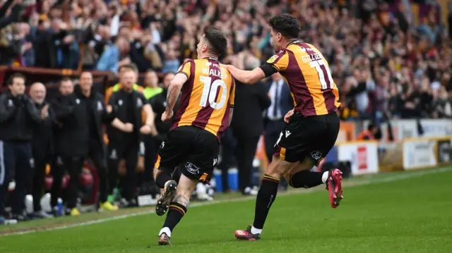 Jamie Walker celebrates his goal for Bradford