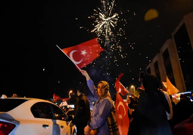 Supporters of Turkish President Tayyip Erdogan and AK Party (AKP) celebrate early results