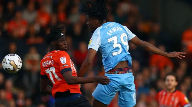 Luton and Sunderland players go up for a header