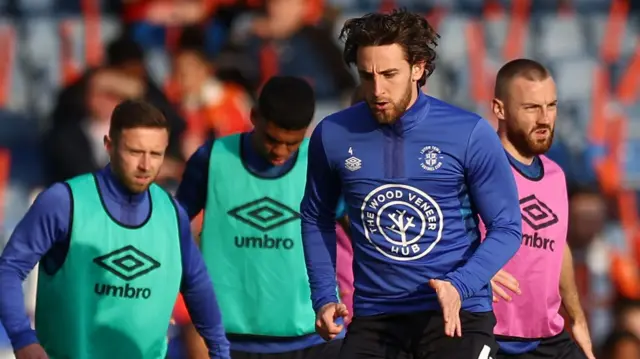 Luton Town players warm up