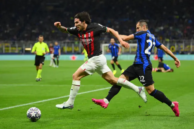 Sandro Tonali and Henrikh Mkhitaryan