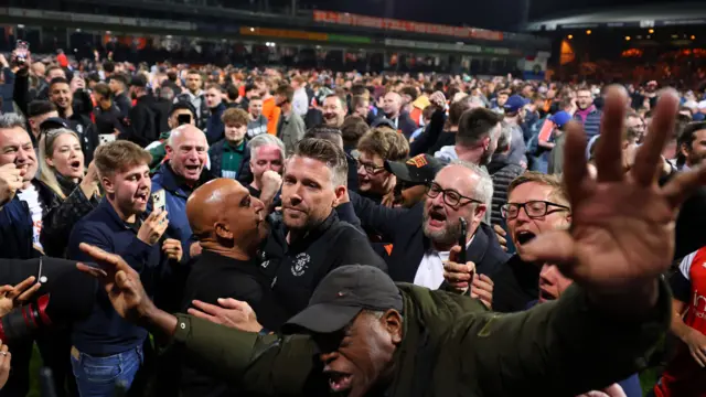 Rob Edwards congratulated by fans after play-off victory